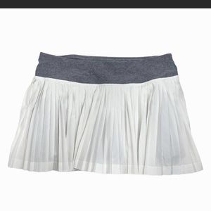 Lulu Pleat To The Street Skirt
